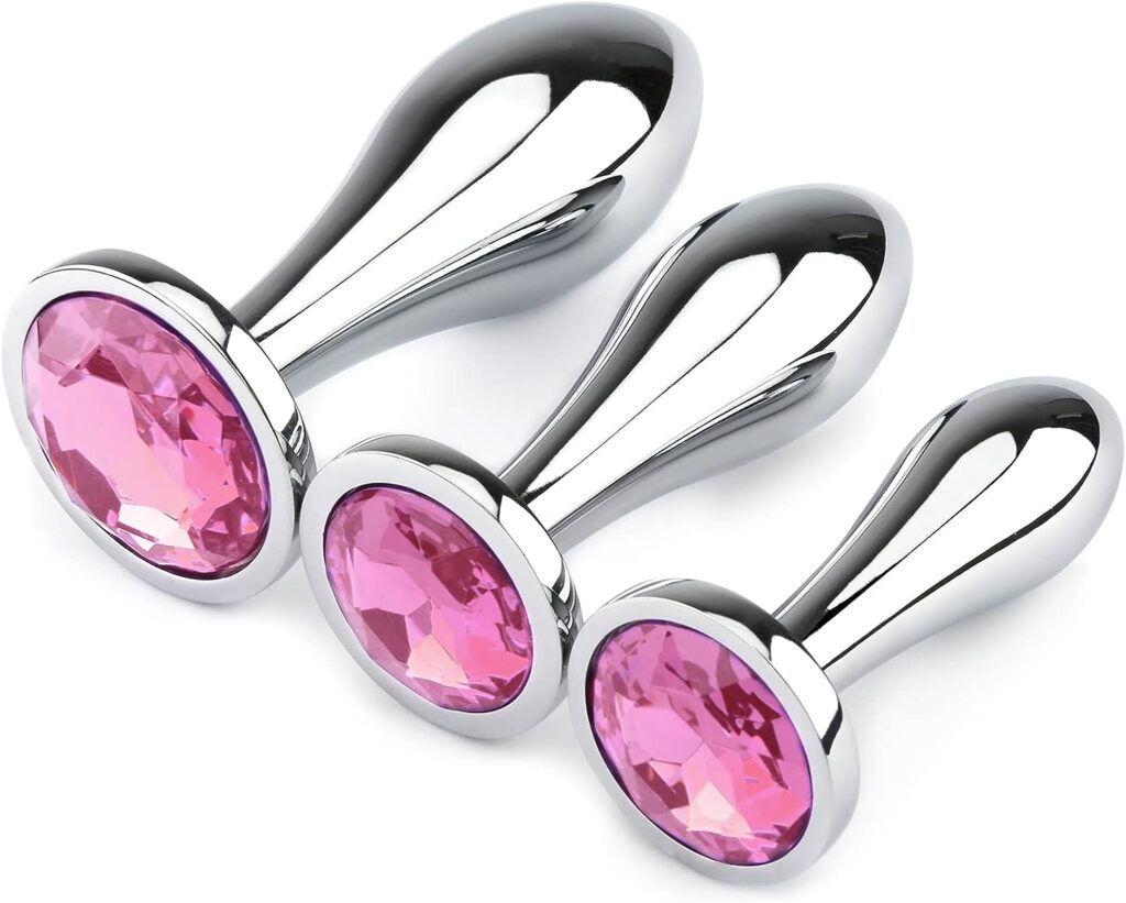 3 piece metal butt p;ug set with pink jeweled bases