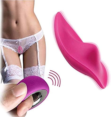 Pink panty vibrator installed in white lace panties. Remote control also shown.